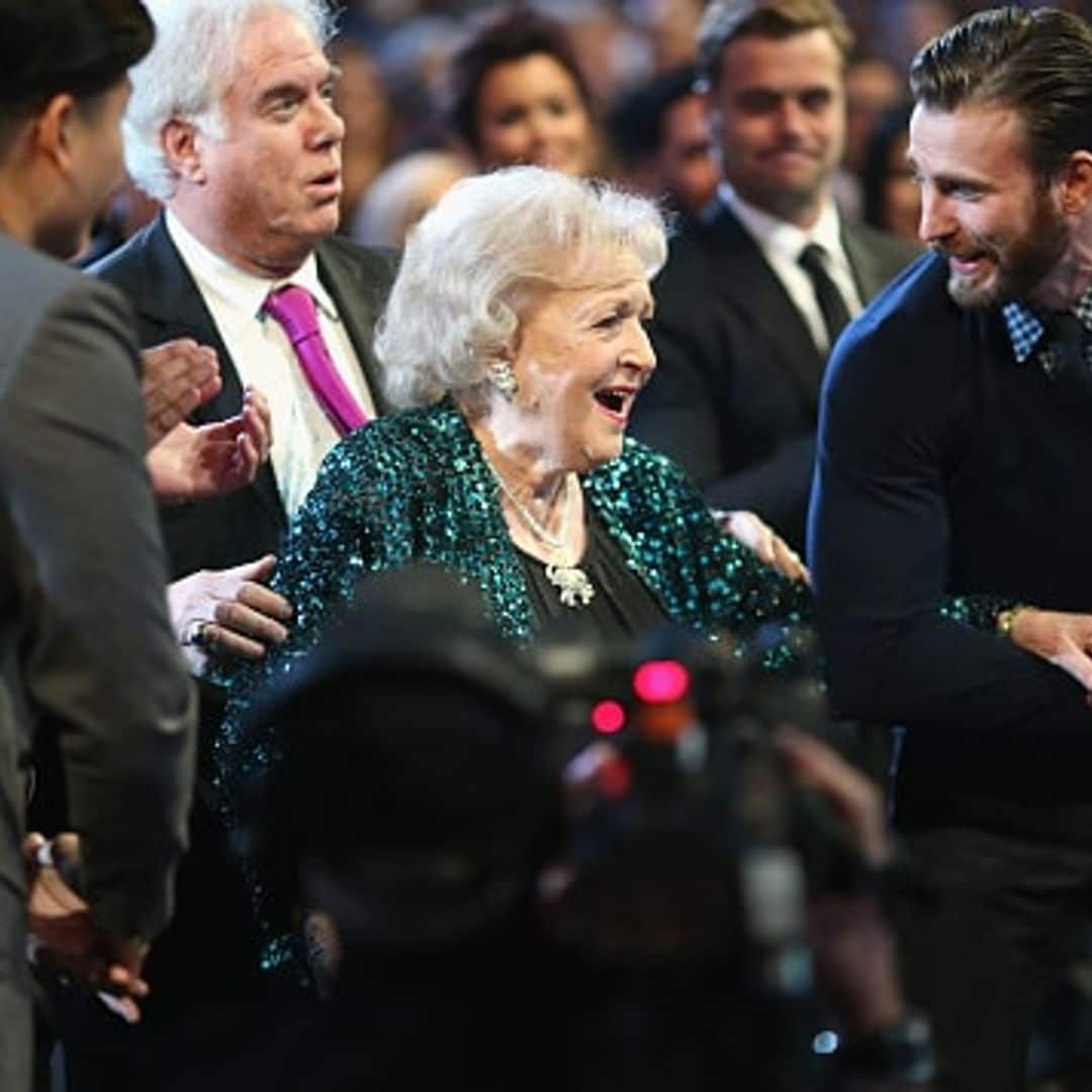 Chris Evans serves as Betty White's arm candy at People's Choice Awards