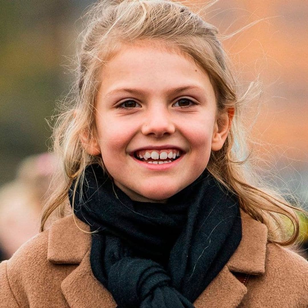 Princess Estelle, 9, steps out to see artwork with her parents