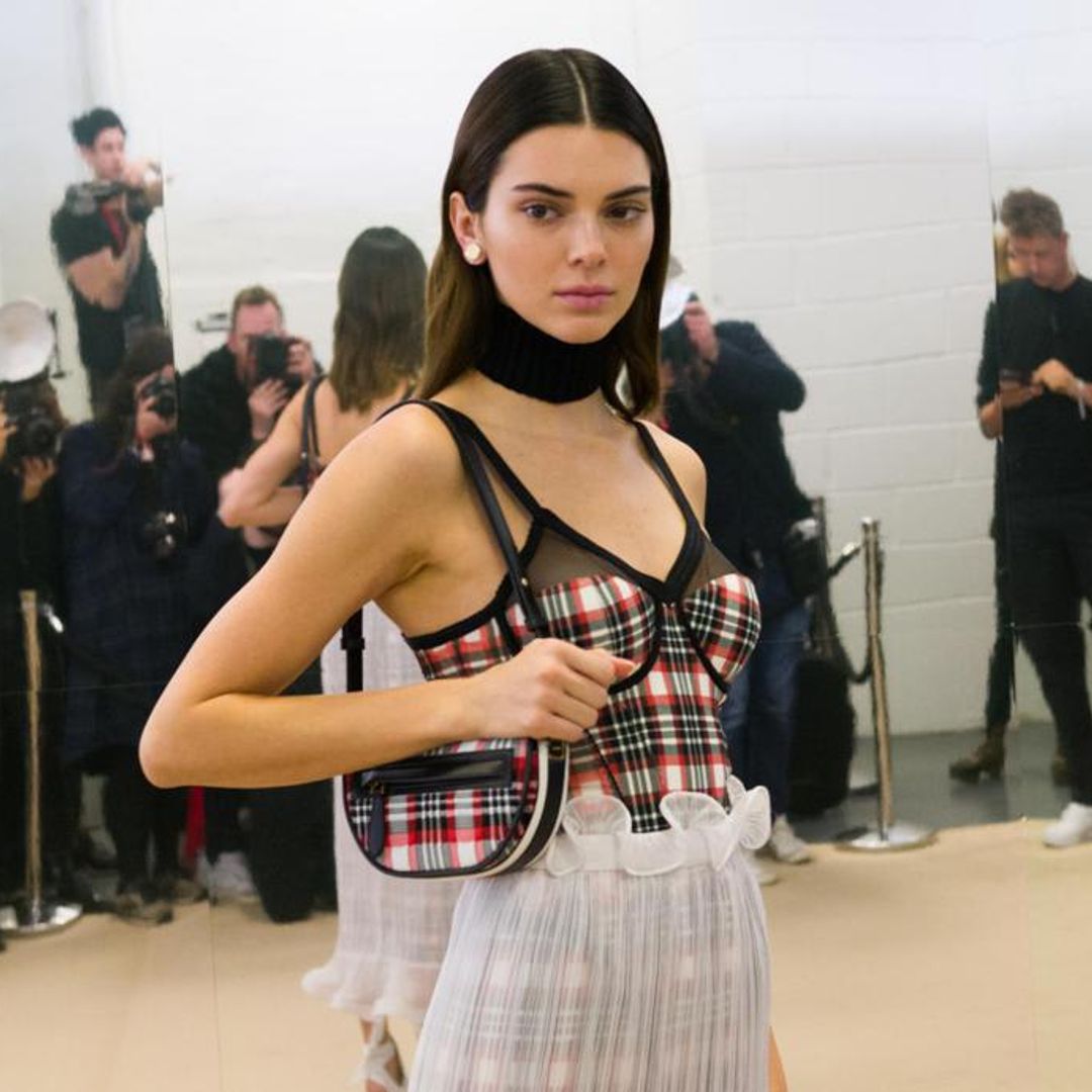 Kendall Jenner joins the big-toe sandal trend and styles it with a skimpy silk dress