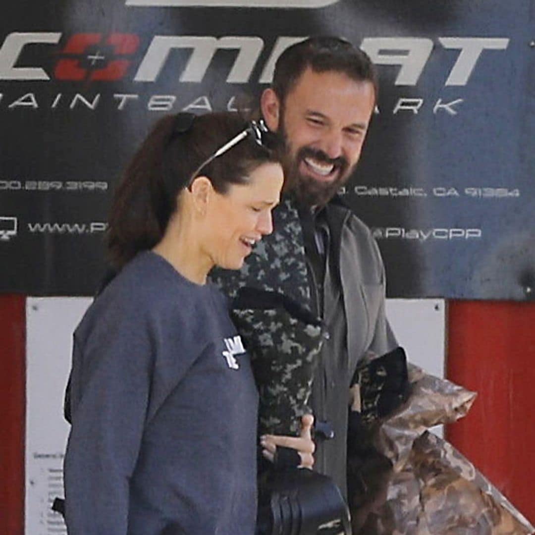 Ben Affleck and Jennifer Garner laugh as they play paintball with their kids