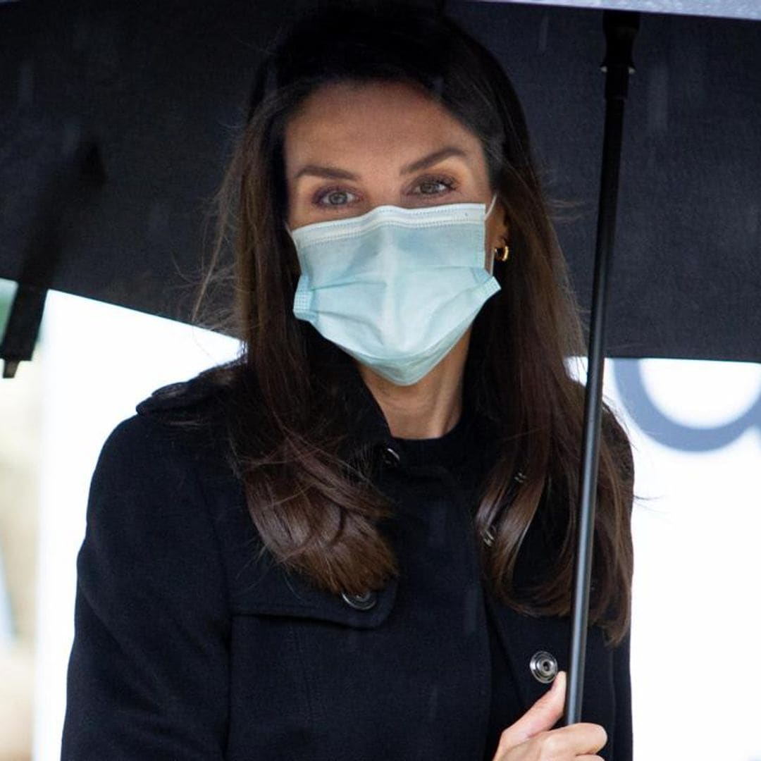 Queen Letizia cuts stylish figure in the rain