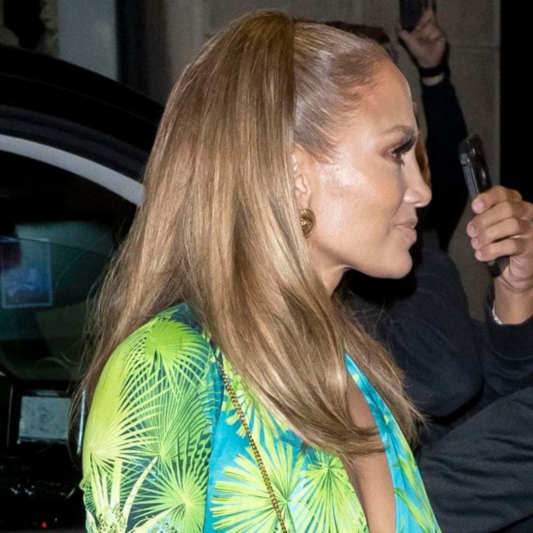 Jennifer Lopez take a cue from herself in a Versace mini dress