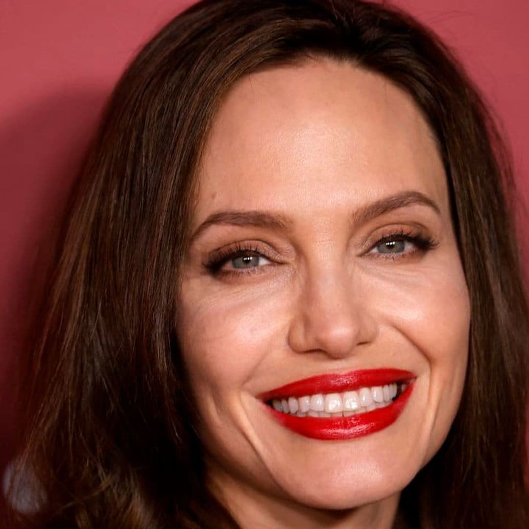 Angelina Jolie signs autographs and takes selfies with fans before private book signing