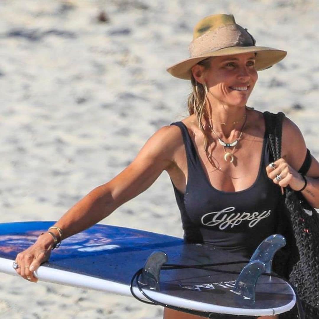 Thor who? Elsa Pataky looks perfectly toned during surf lessons