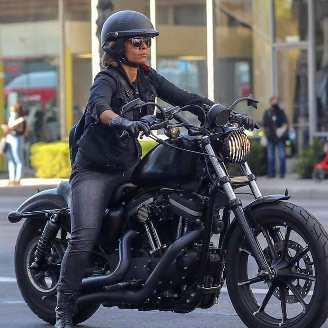 Halle Berry looks biker chic while riding a Harley Davidson motorcycle