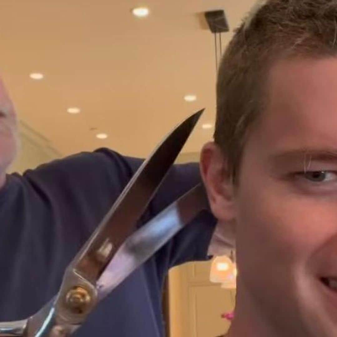 Arnold Schwarzenegger gives Patrick a Terminator approved haircut using large shears