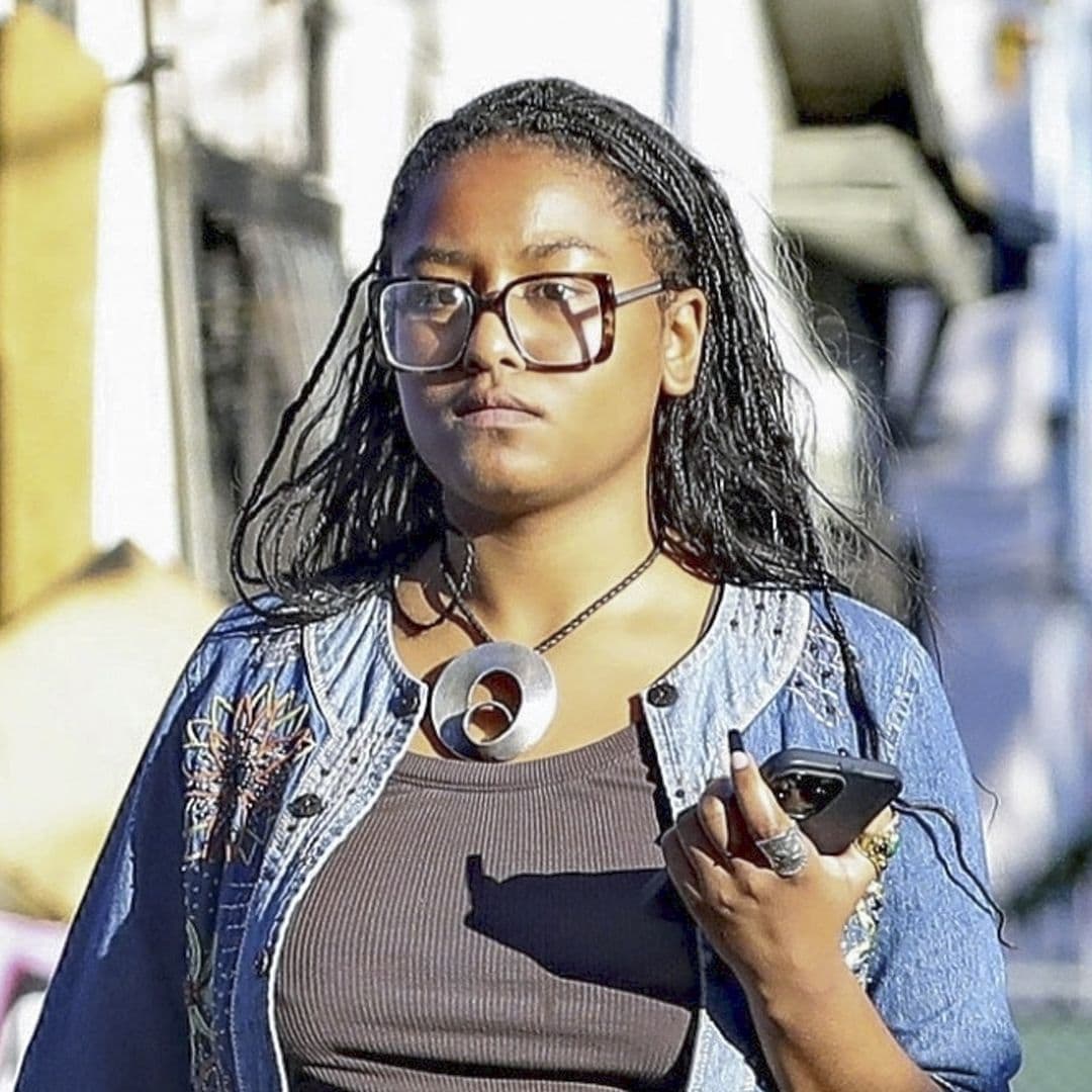 Sasha Obama steps out in Los Angeles wearing brown button-down and jean shorts