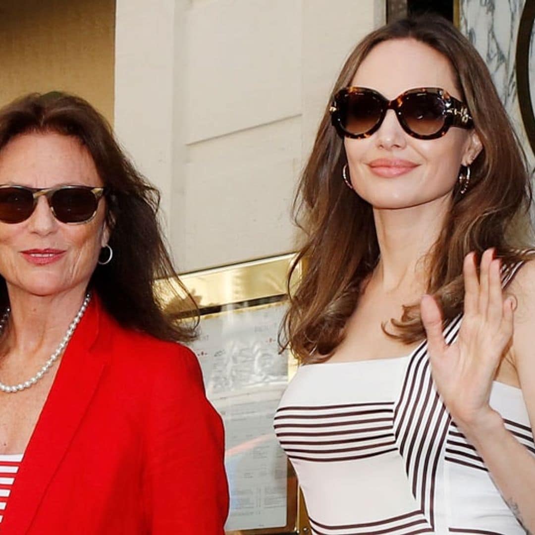 Angelina Jolie and her godmother take on Parisian elegance with a series of twinning looks