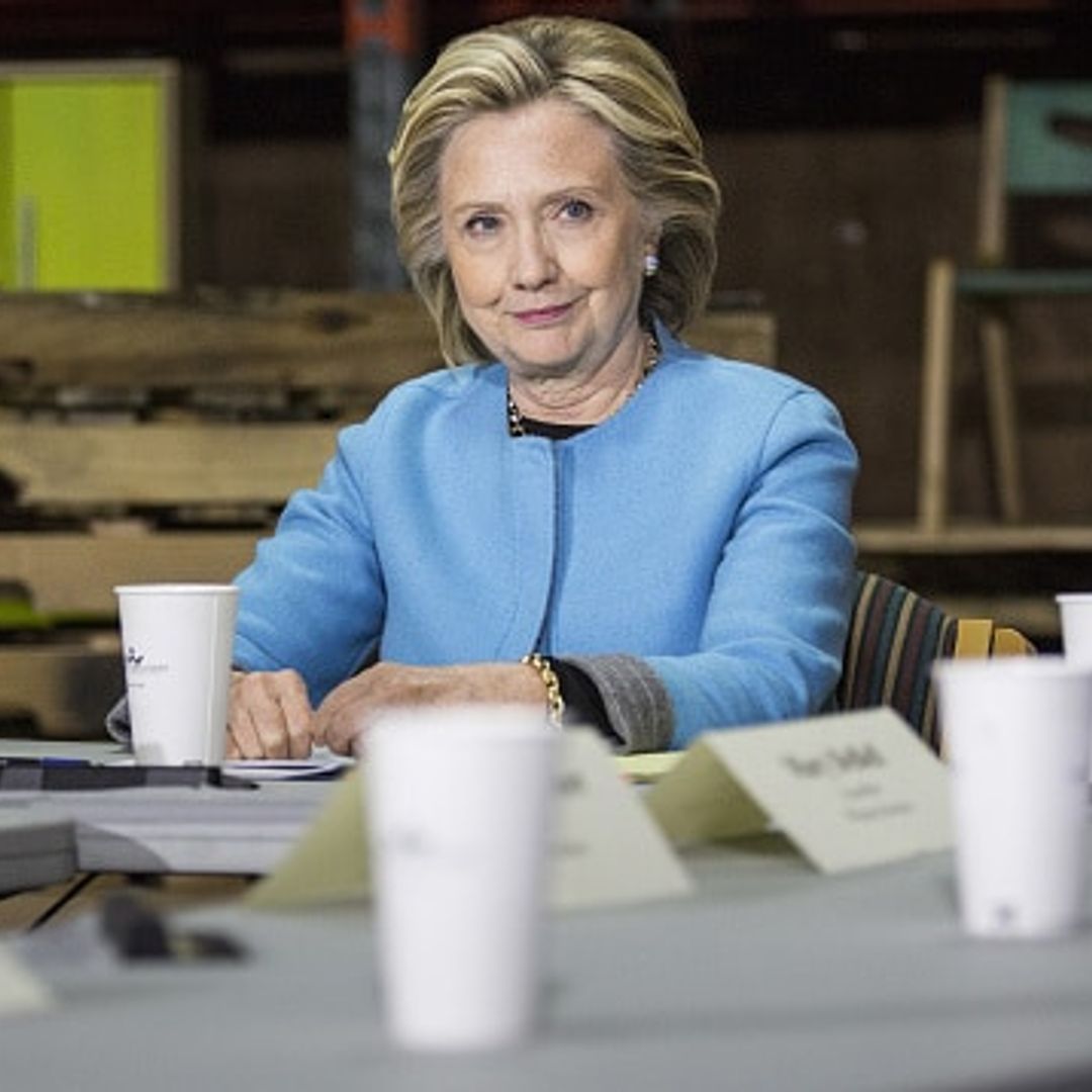 Hillary Clinton glows in bright blue on the campaign trail in New Hampshire