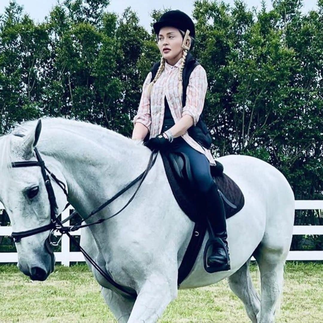 Madonna rides a horse while relaxing on the ranch with her kids