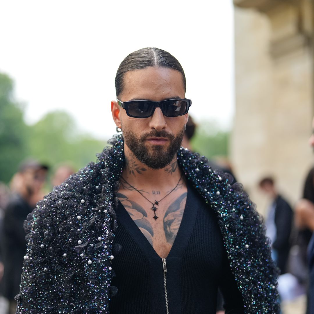 Maluma is on full daddy duties as he, Paris, and Susana Gomez arrive in Italy