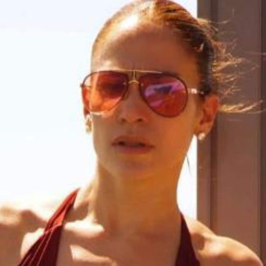 Jennifer Lopez shows off her beach body in red hot swimsuit