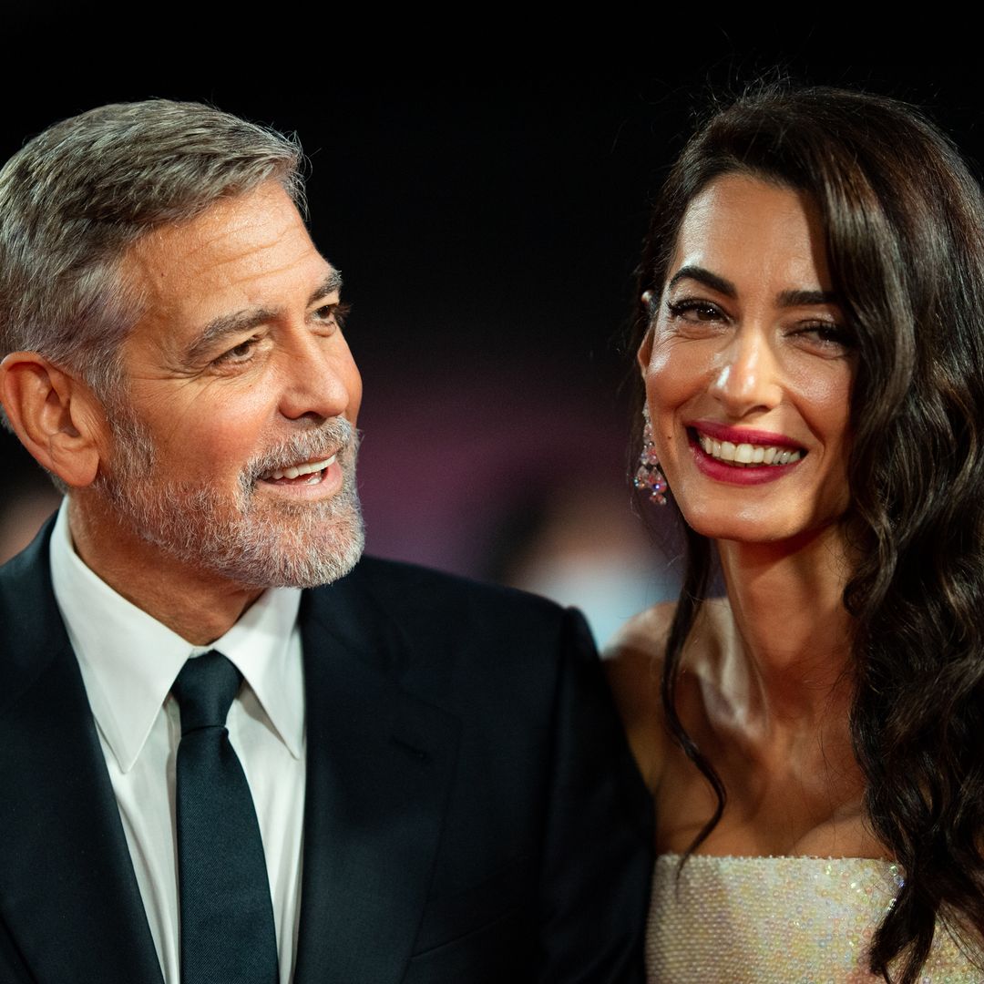 George and Amal Clooney hold hands for date in St. Tropez