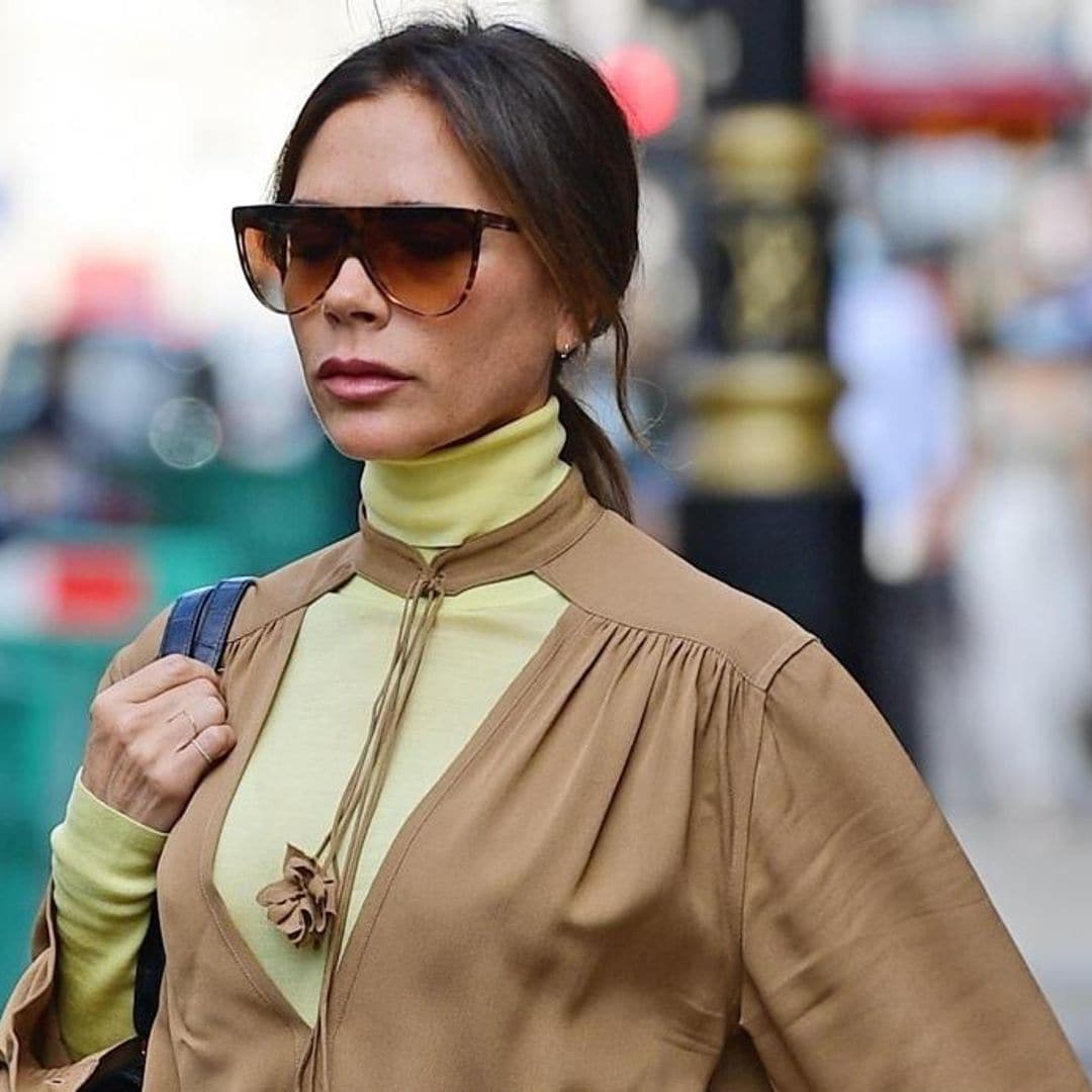 Victoria Beckham stuns in a monochromatic beige ensemble and blue suede stilettos