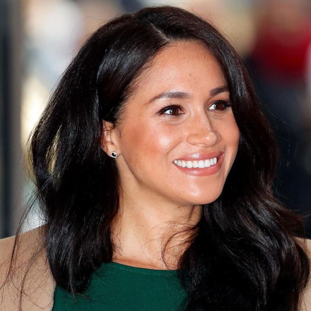 Meghan Markle returns to her favorite color palette wearing a chic $920 dress