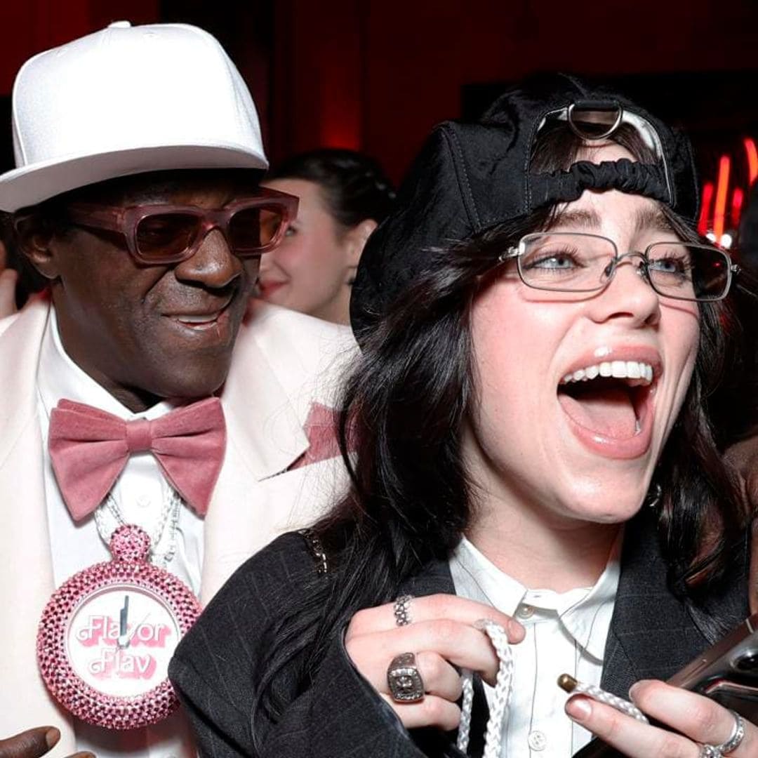 Flavor Flav gifts Billie Eilish a custom Barbie clock necklace at Vanity Fair Oscar party