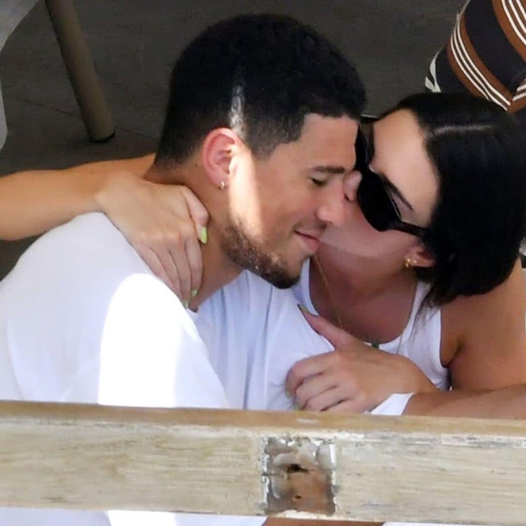 Kendall Jenner wasn’t shy about kissing Devin Booker at lunch in Italy