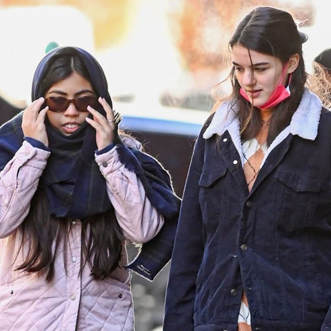 Suri Cruise spends the day with a friend in chilly NYC