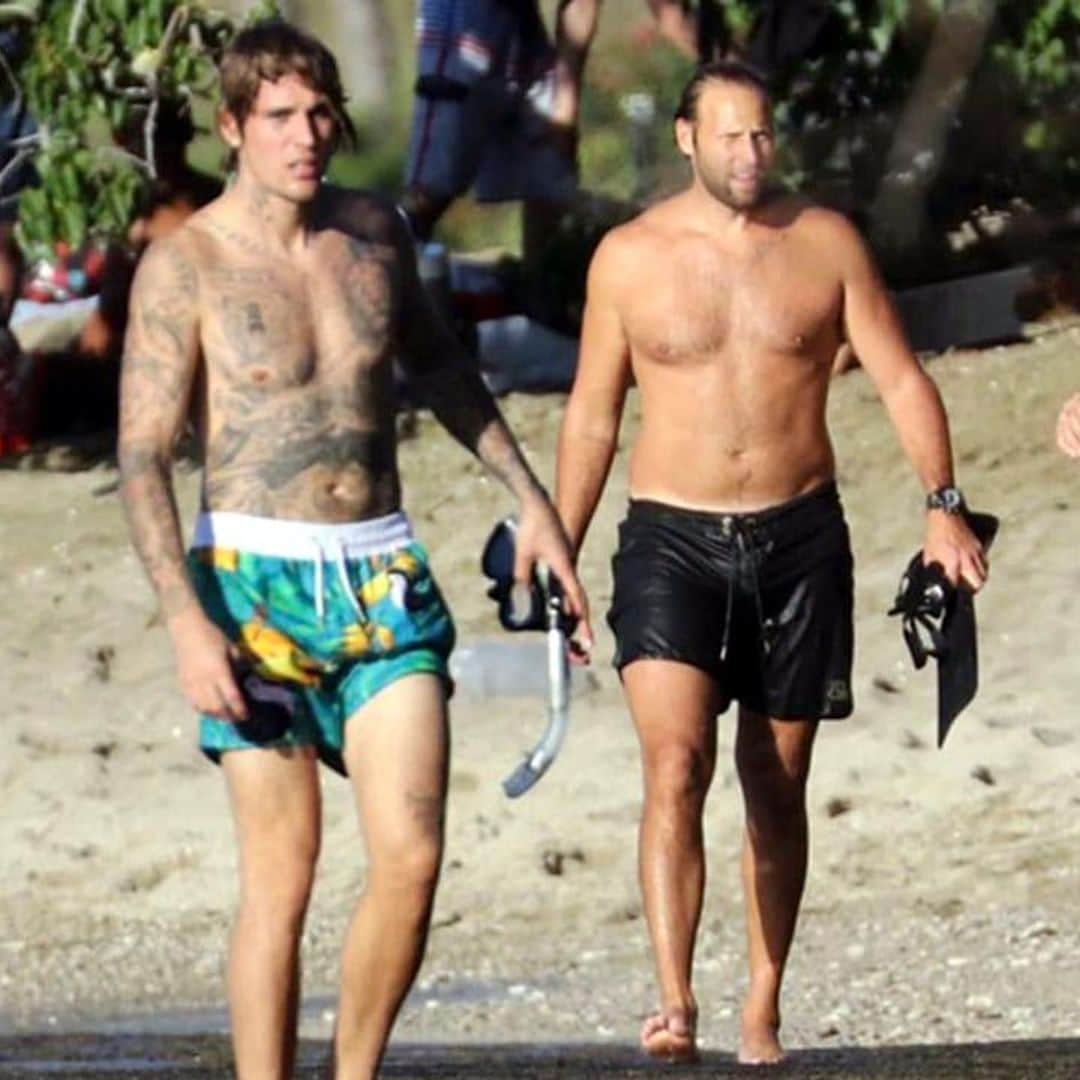 Justin Bieber shows off growing tattoo collection while snorkeling in Hawaii