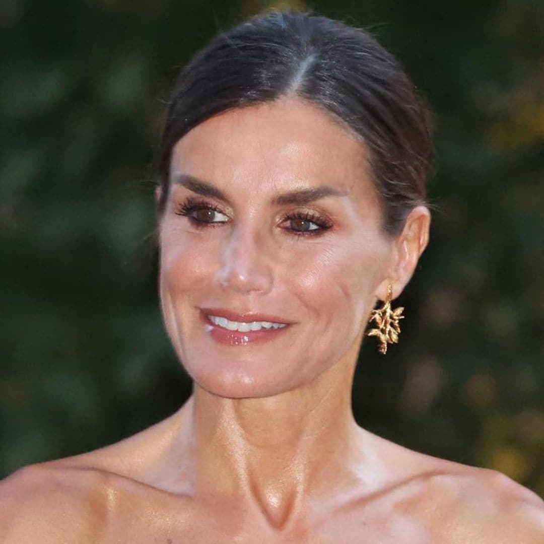 Queen Letizia bares her shoulders in summer maxi dress