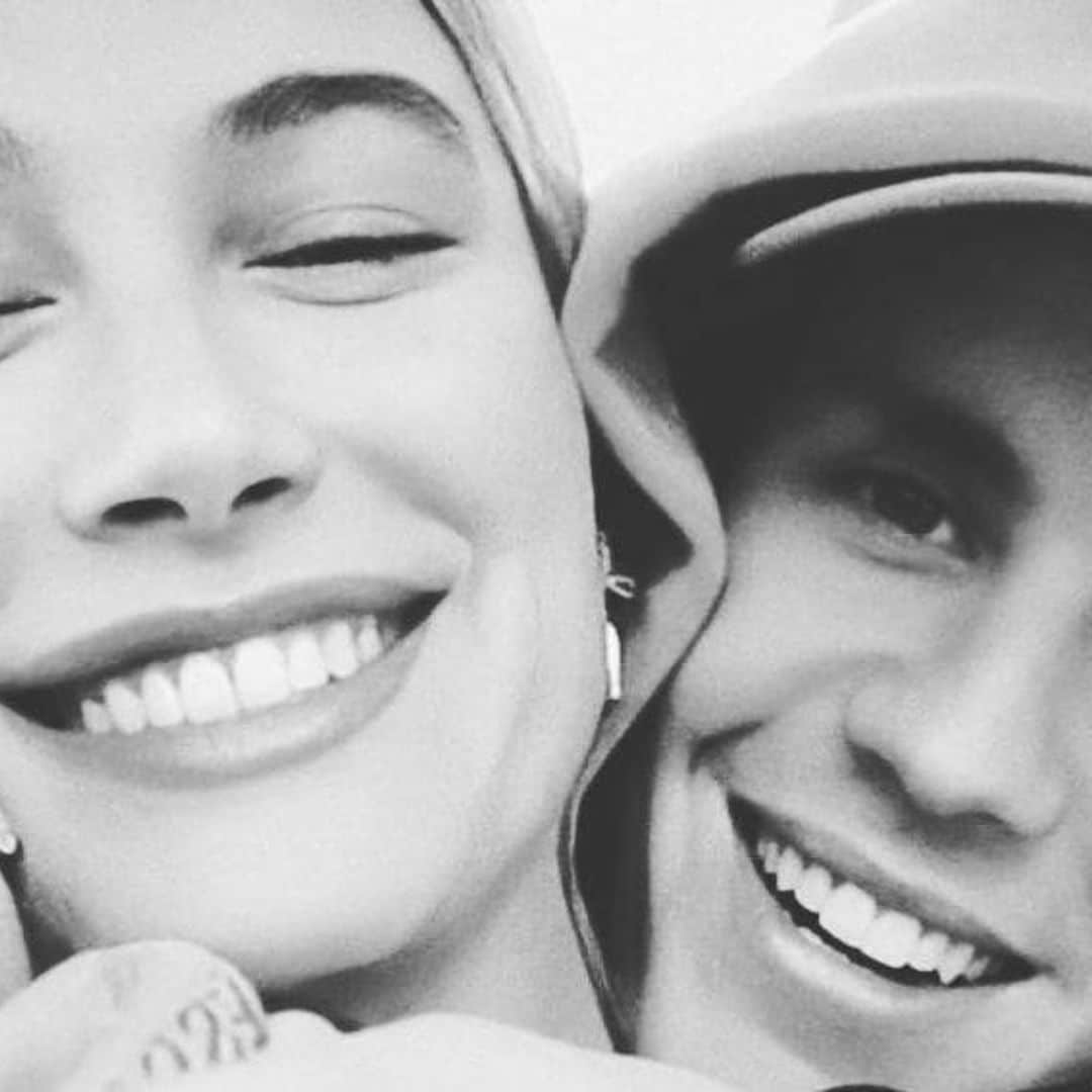 Justin and Hailey Bieber laid in bed posing for an extremely sexy shoot for Vogue Italia