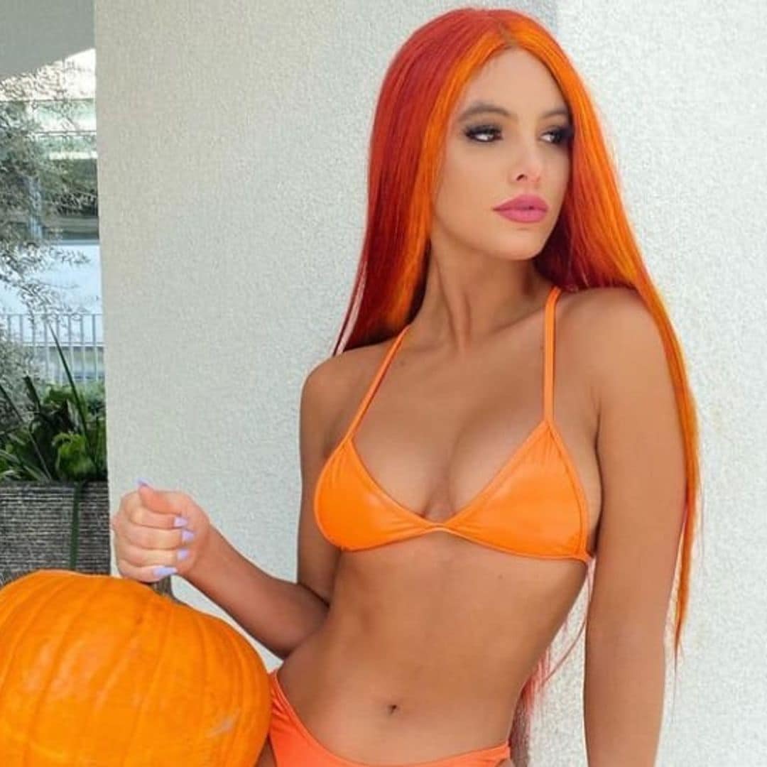 Lele Pons goes full Halloween glam in an orange bikini