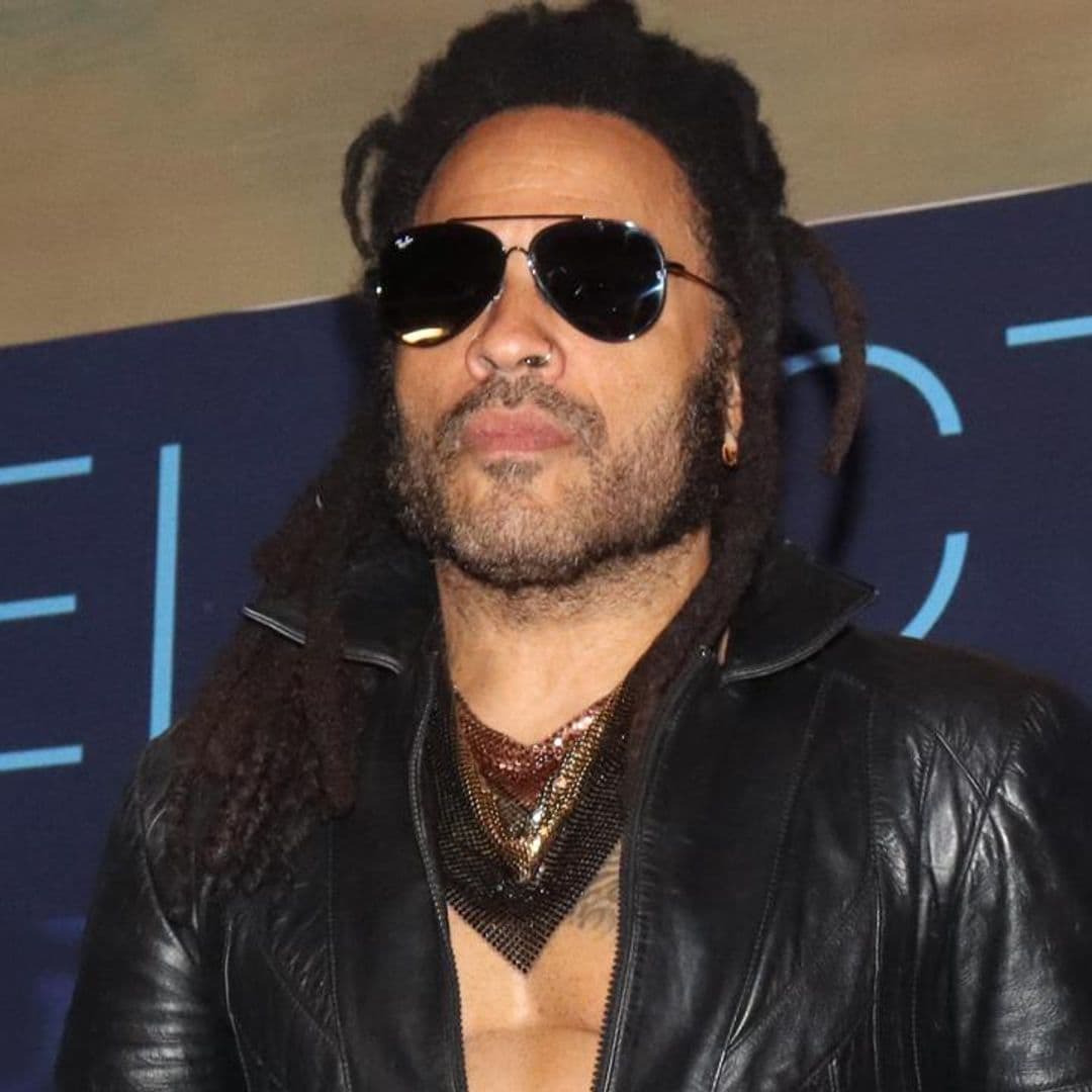 Lenny Kravitz works out in leather pants, boots, and a mesh tank top in must-see video