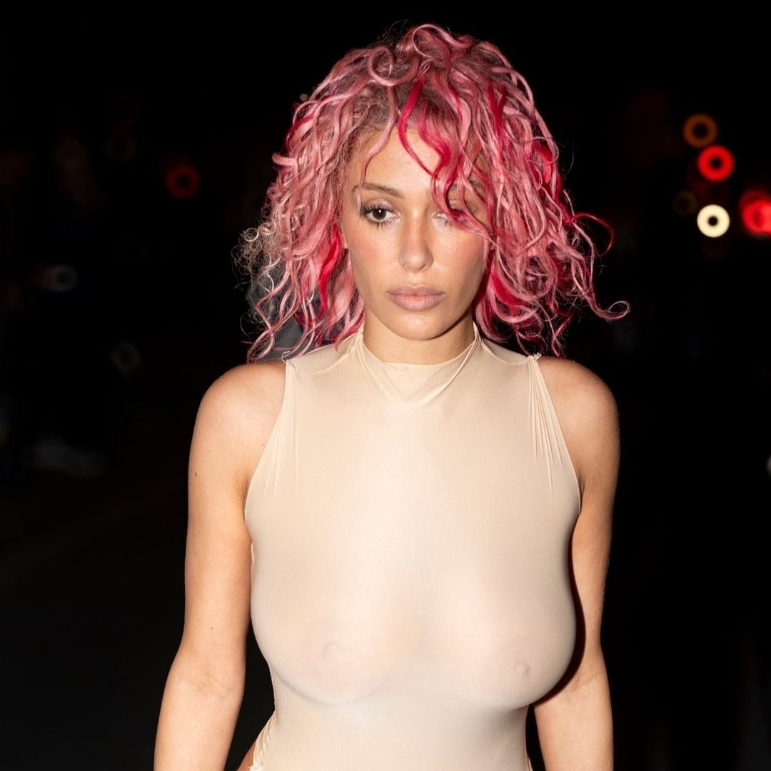 Bianca Censori steps out in sheer cut-out bodysuit and pink hair