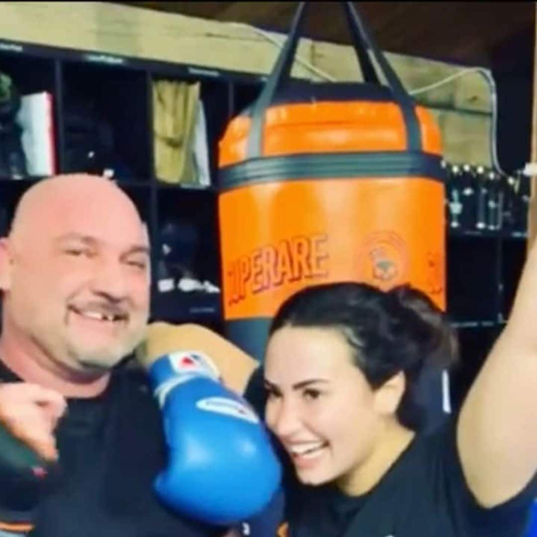 K.O.! Demi Lovato is 'sorry (not sorry)' after knocking trainer's tooth out