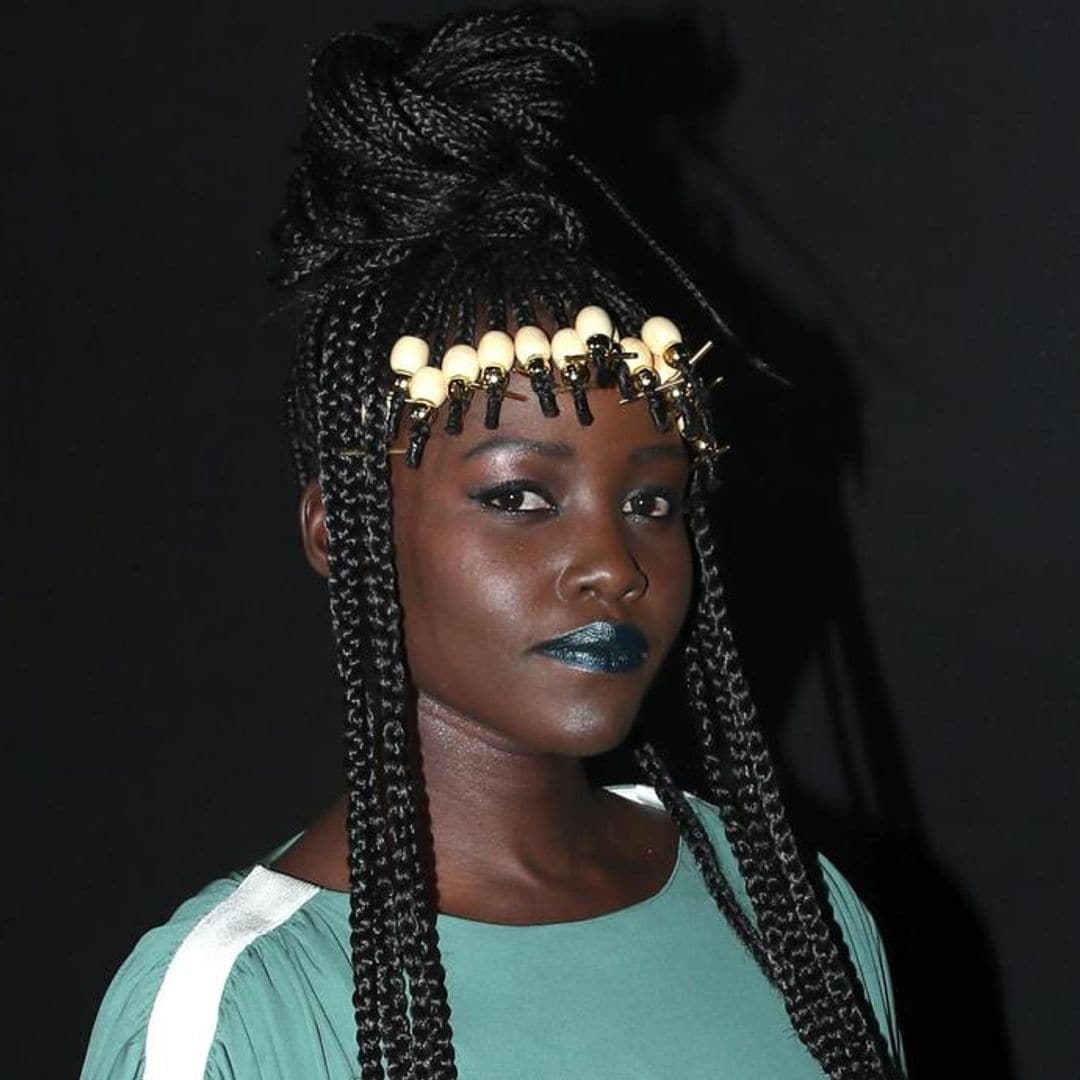 Lupita Nyong’o makes a bold beauty statement and rocks metallic green lips at Paris Fashion Week