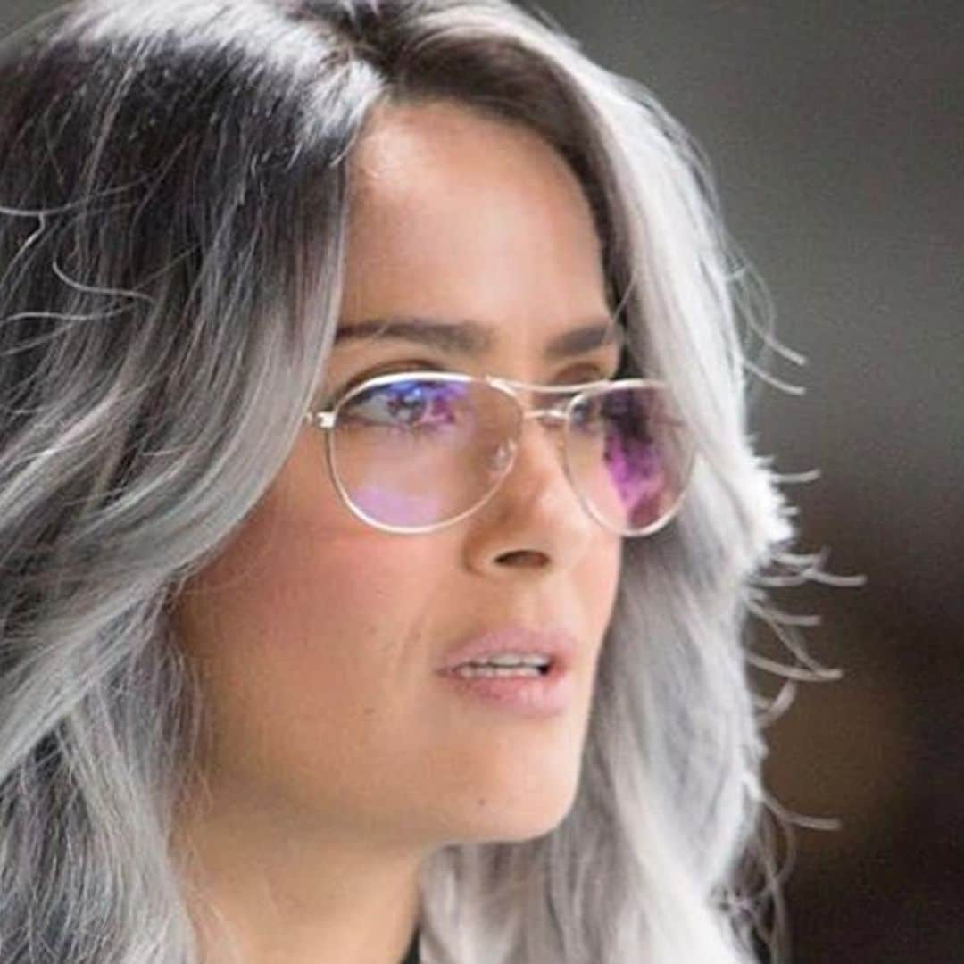 Salma Hayek transforms on movie set with tattoos and vinyl jumpsuit