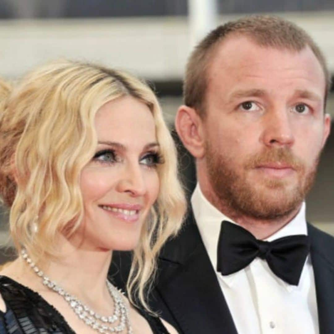 Guy Ritchie brings a bottle of wine as he visits Madonna's house