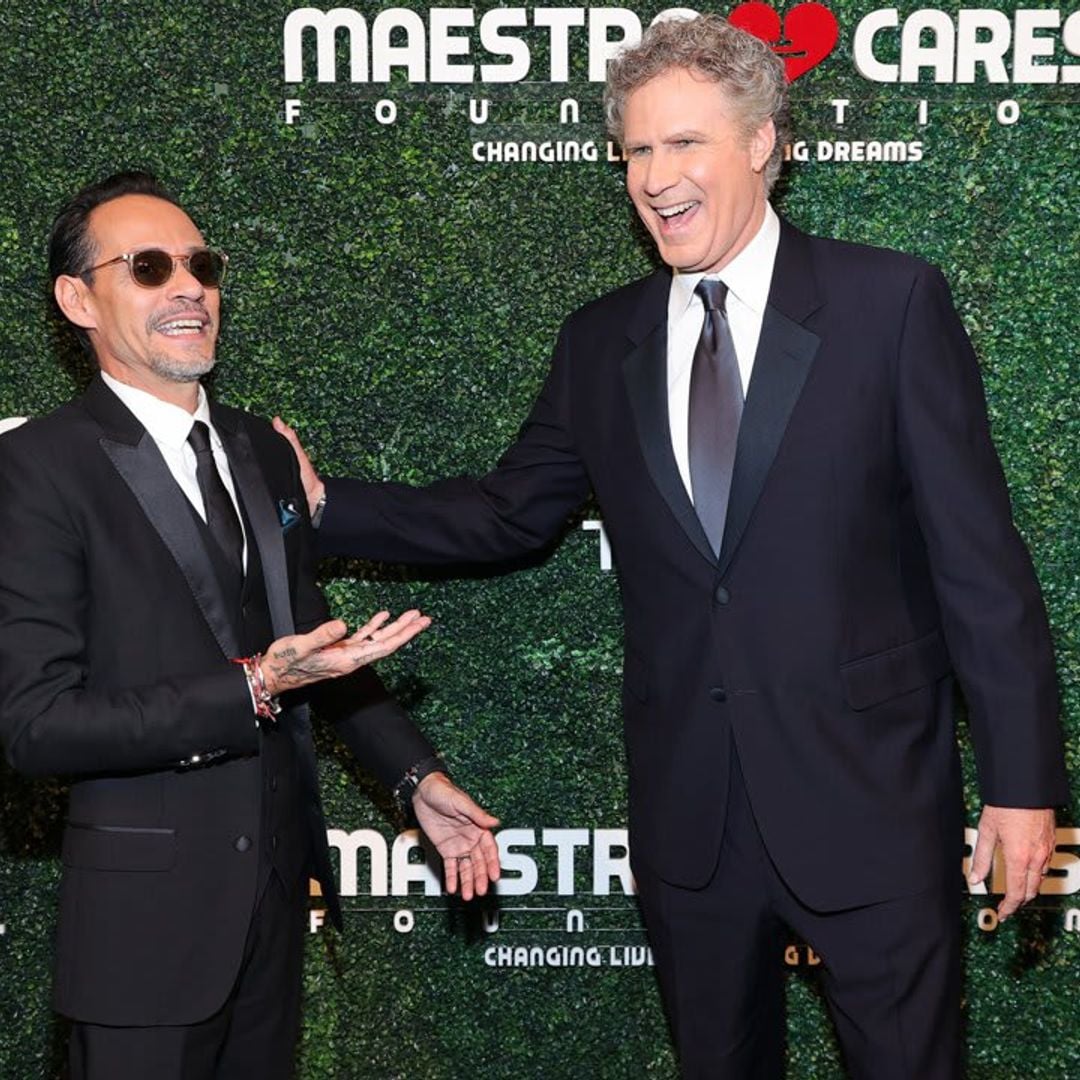 Will Ferrell brings his cowbell on stage to perform “I Need to Know” with Marc Anthony