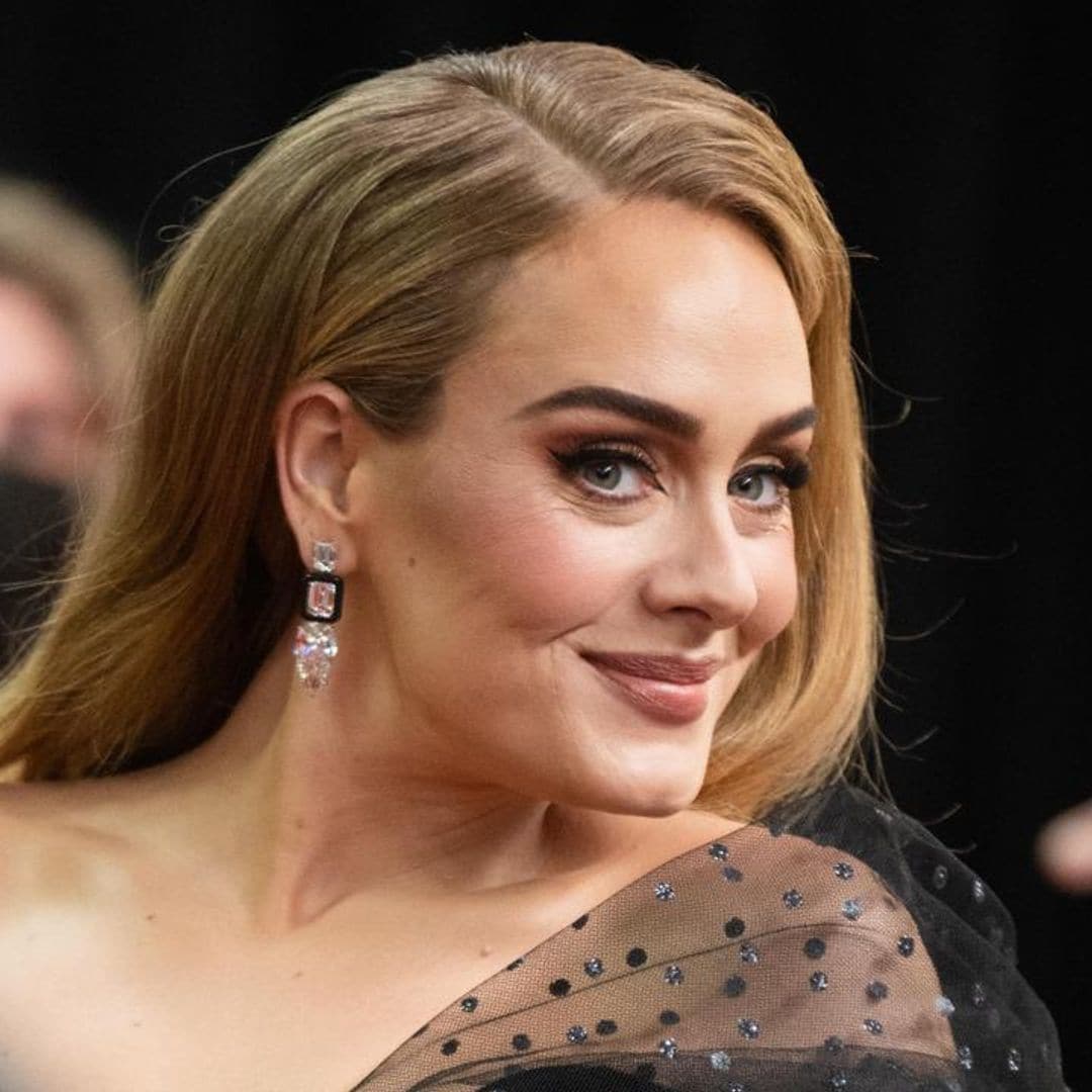 Adele celebrates her 34th birthday in custom Carolina Herrera mini-dress