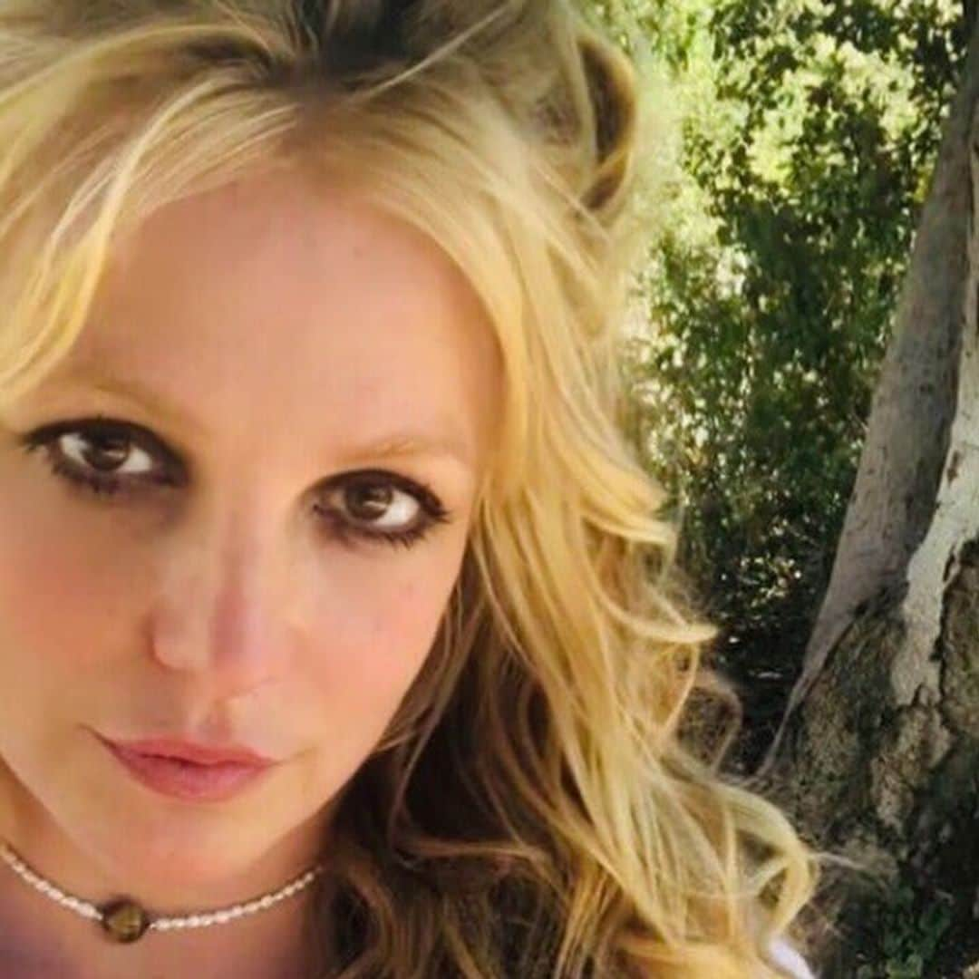 Britney Spears challenges fans to find her in ‘freaking cool’ waterfall photo