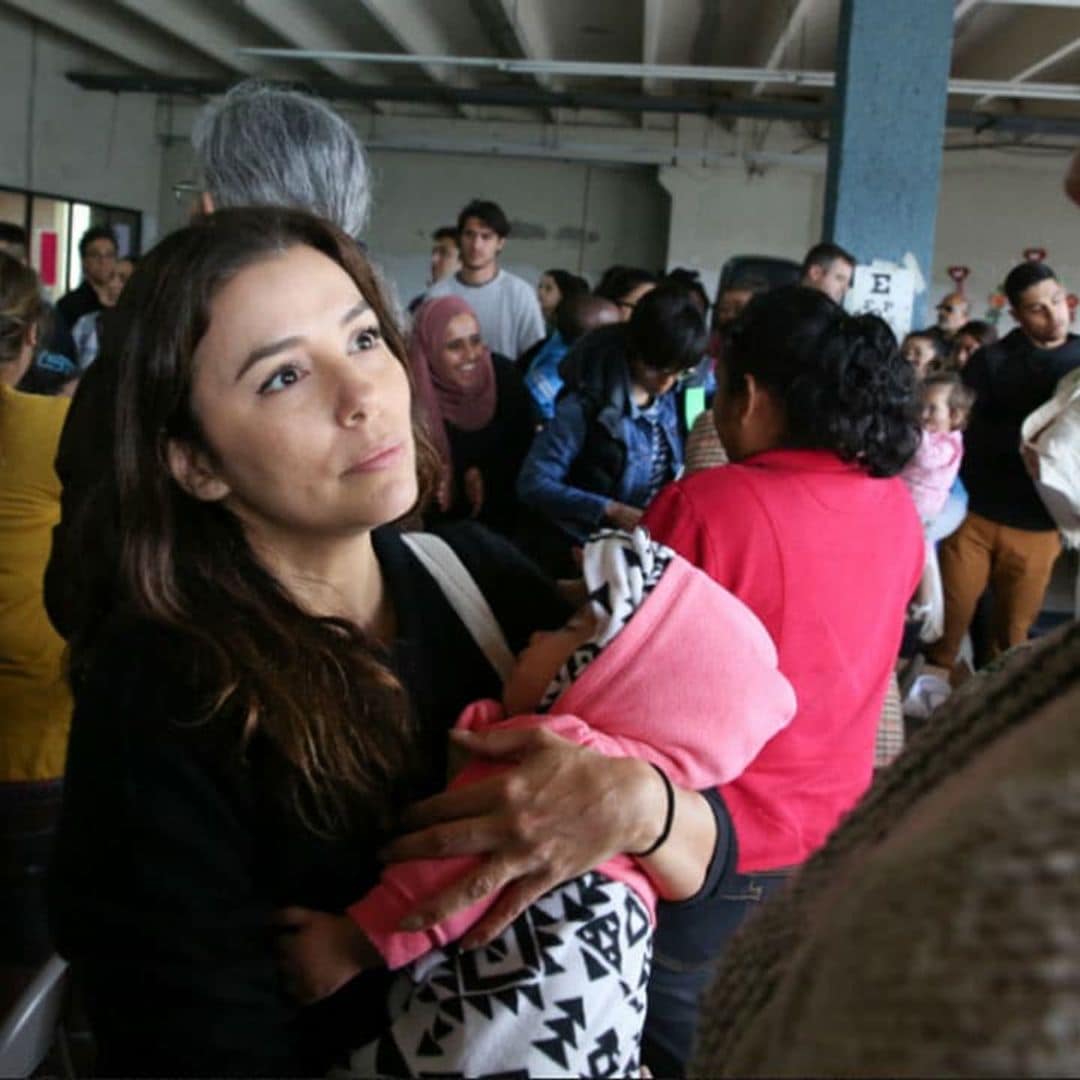 Emotional Eva Longoria cradles baby as she hears mother's story at Tijuana Border Crossing