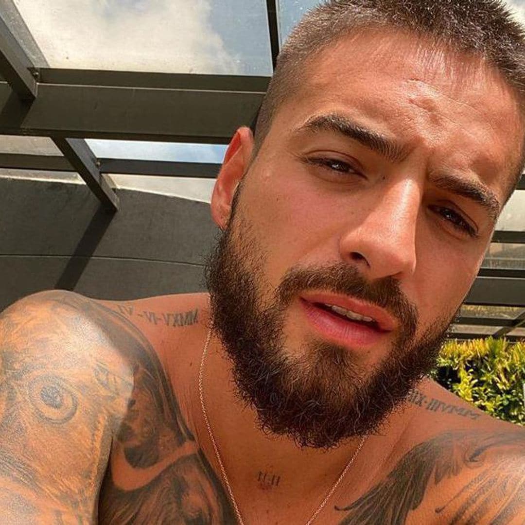 Maluma shows off impressive six-pack abs and tattoos during shirtless dance