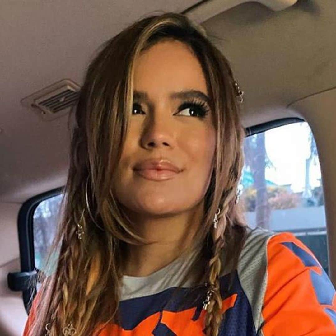 Karol G shows off cool braids and hair jewelry with trendy new look