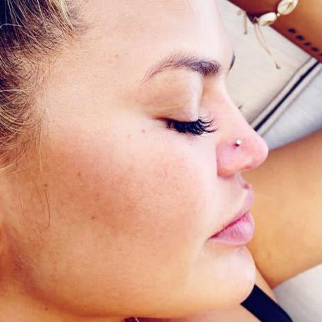 Chrissy Teigen gets nose re-pierced after first botched attempt