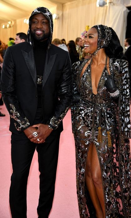 NBA former player Dwyane Wade with wife Gabrielle Union speak with