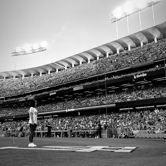 Becky G attends The Los Angeles Dodgers Game at Dodger Stadium on