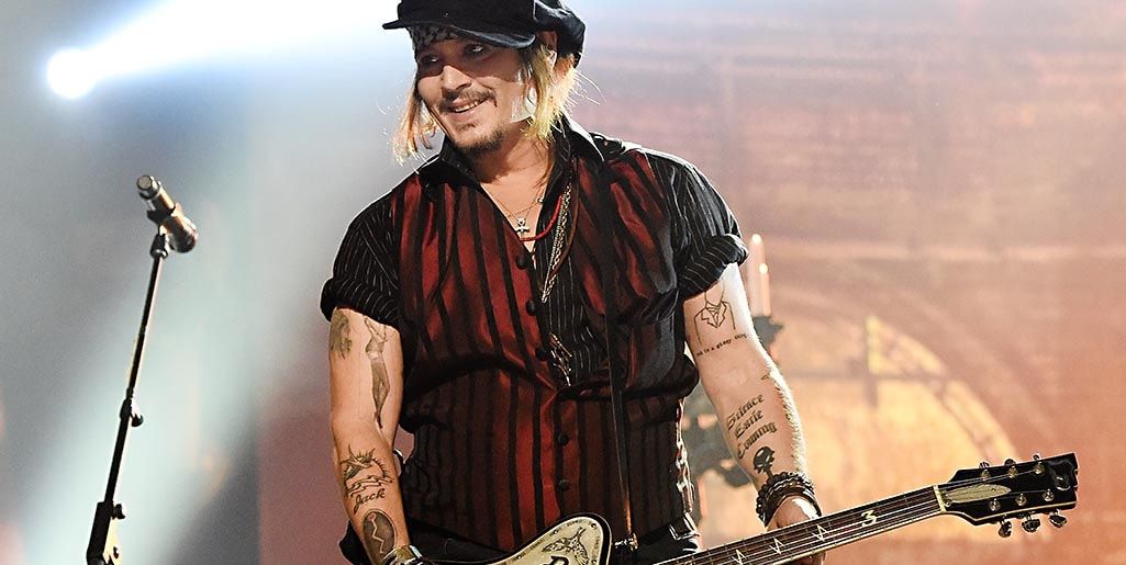 Johnny Depp's tattoos tell the story of his life - find out more - Foto 1