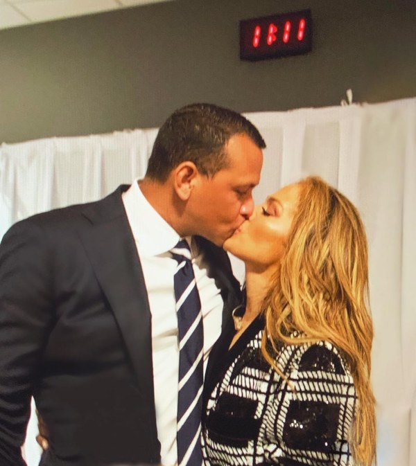 Alex Rodriguez Kisses Jennifer Lopez At Her 50th Birthday Party