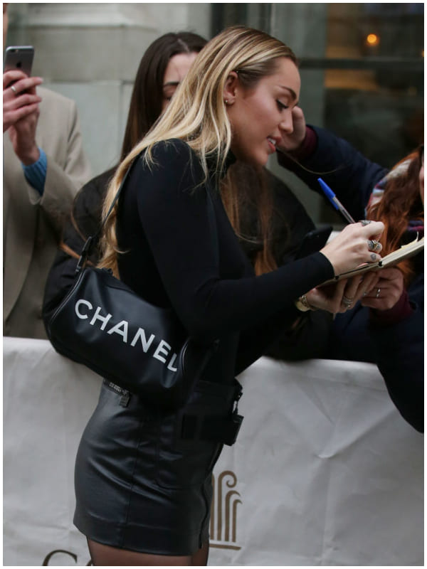 Giant handbags from Dior, YSL in style with J.Lo, Miley Cyrus