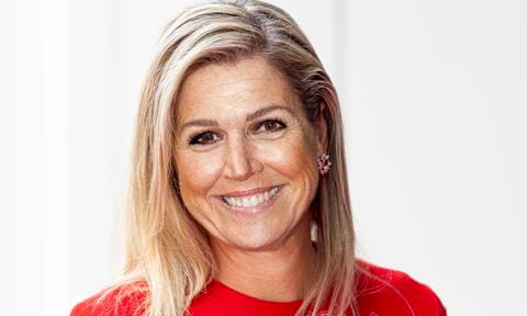 See Queen Maxima pose for a photo with a hedgehog